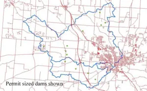 A map of the river with red dots showing where dams are.