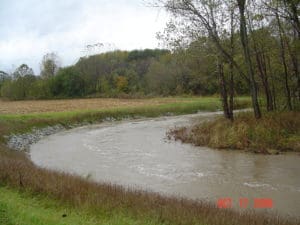 Streambank toe armed with riprap prevents undercutting